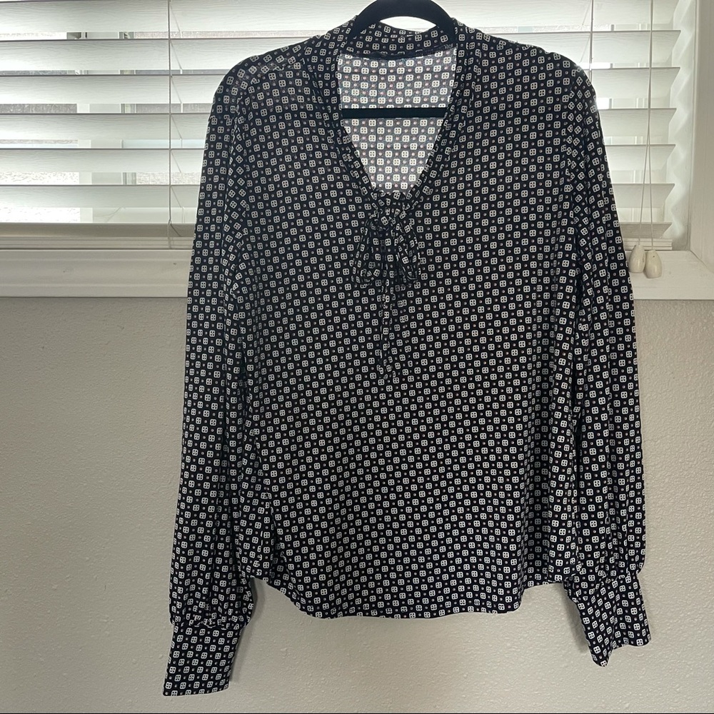 Women’s dress shirt.